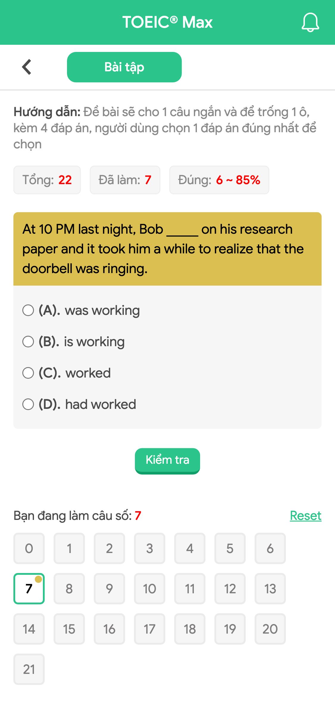 At 10 PM last night, Bob _____ on his research paper and it took him a while to realize that the doorbell was ringing.