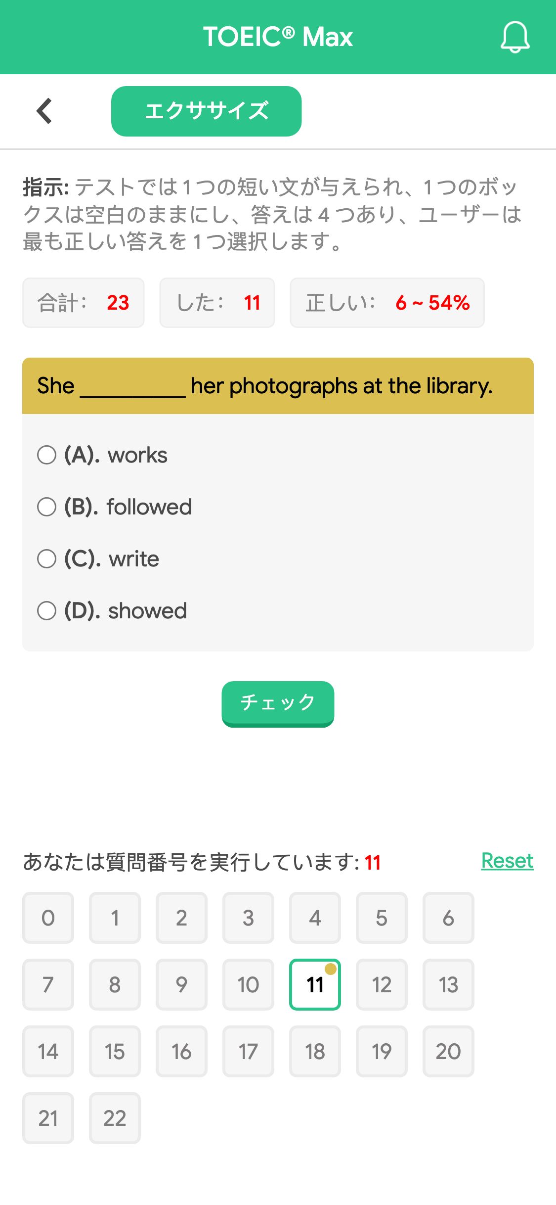 She __________ her photographs at the library.